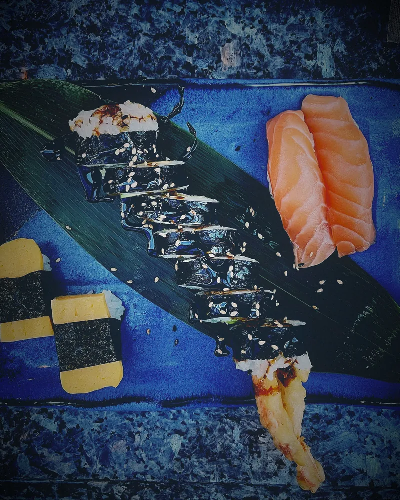 Maki rolls on a dark blue plate